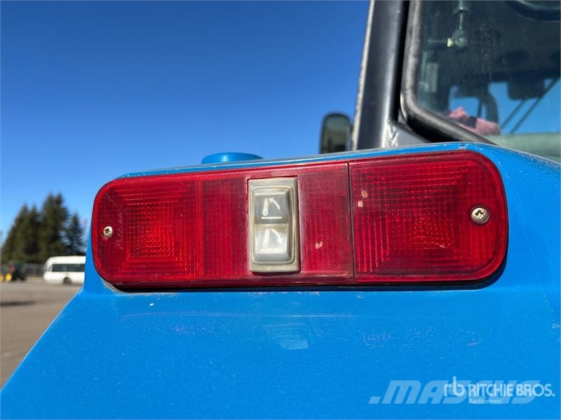 New Holland TS110 الجرارات