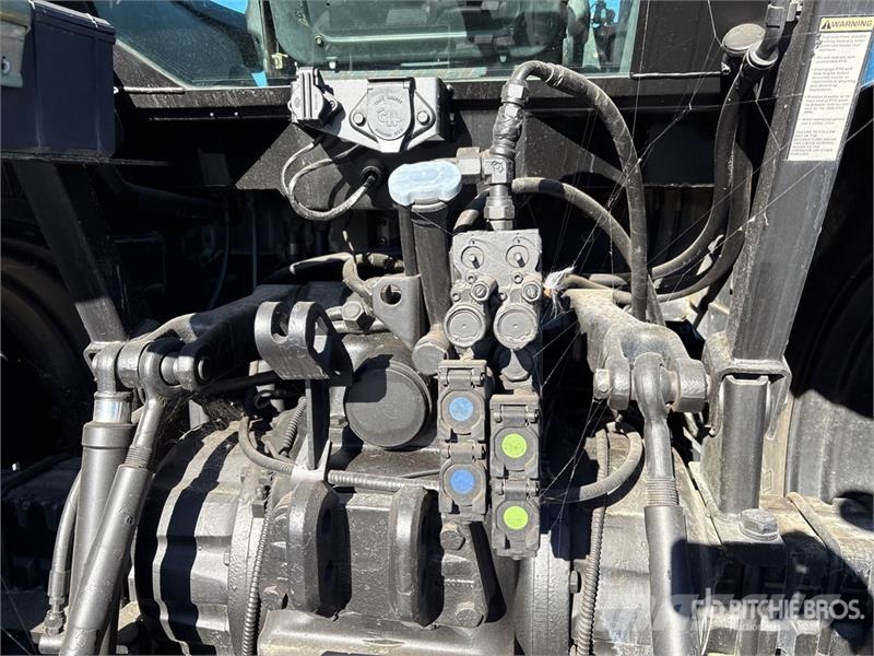 New Holland TS110 الجرارات
