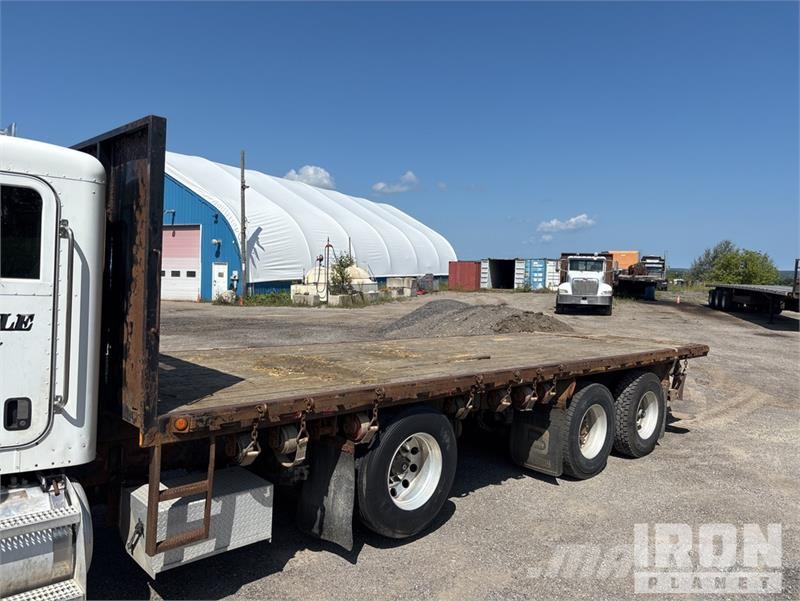 Peterbilt 335 شاحنات مسطحة/مفصلية الجوانب
