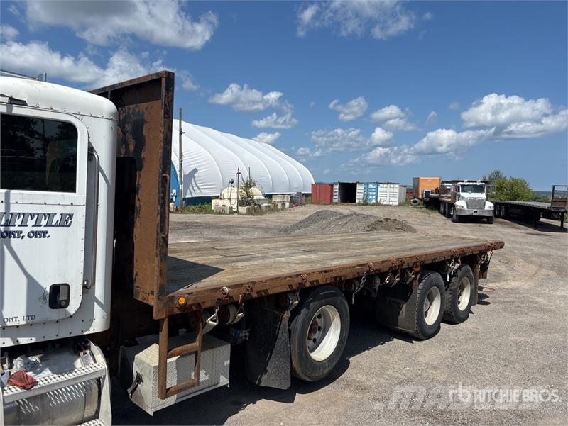 Peterbilt 335 شاحنات مسطحة/مفصلية الجوانب