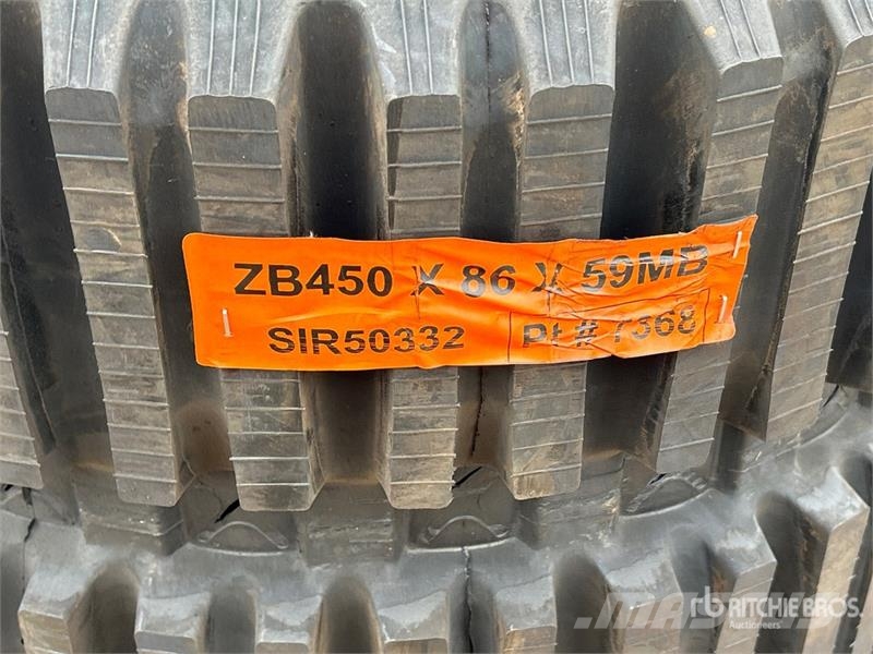  Quantity of (2) 450 mm x 86 mm X 59 mm Rubber Trac مكونات أخرى