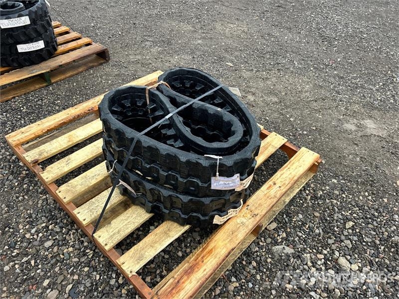 Quantity of (2) 7" Rubber Tracks (Unused) مكونات أخرى