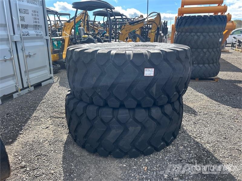 Quantity of (2) TaiHao 29.5x25 E3/L3 Heavy Duty Ti Gume, točkovi i felne