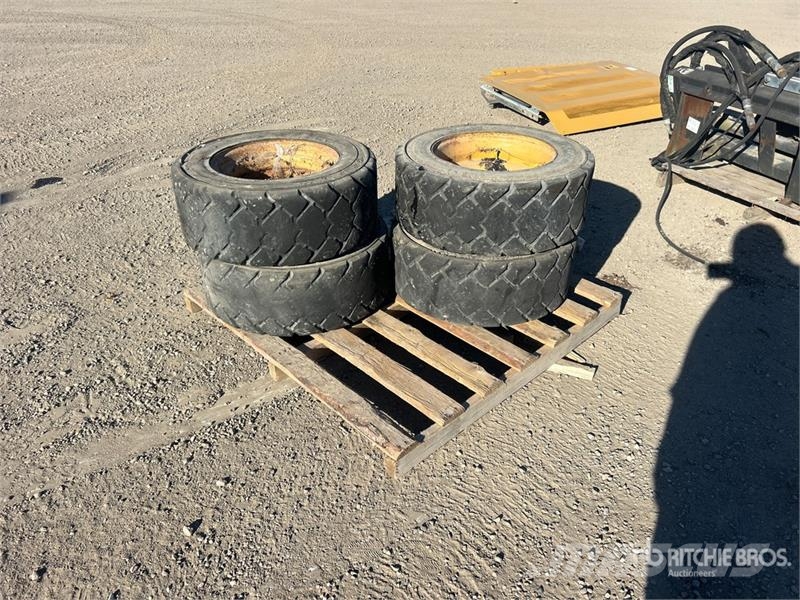 Quantity of (4) 10x16.5NHS Tires Gume, točkovi i felne