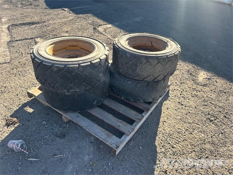 Quantity of (4) 10x16.5NHS Tires Gume, točkovi i felne