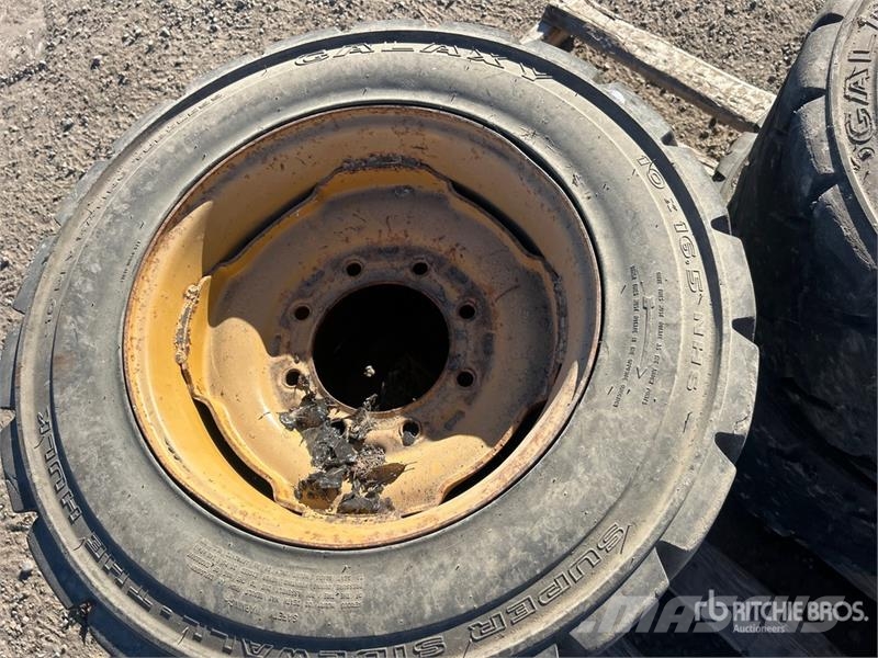 Quantity of (4) 10x16.5NHS Tires Gume, točkovi i felne