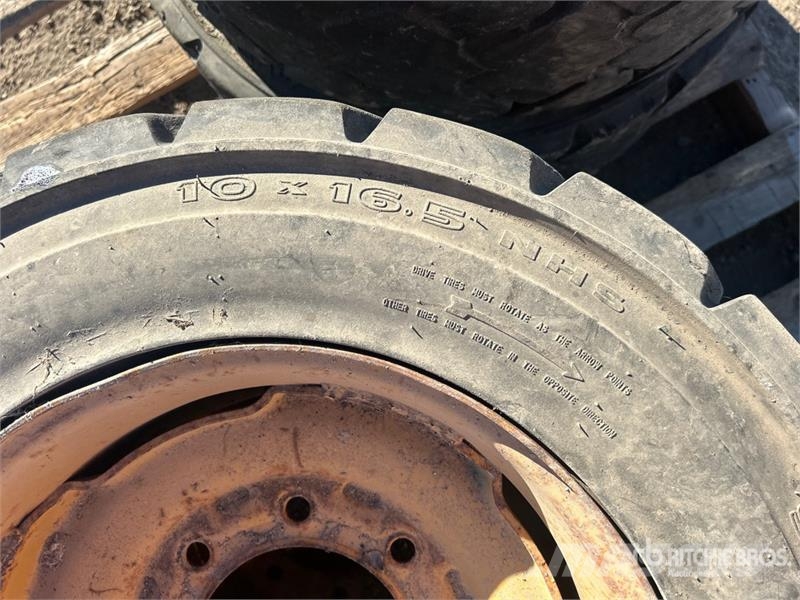 Quantity of (4) 10x16.5NHS Tires Gume, točkovi i felne
