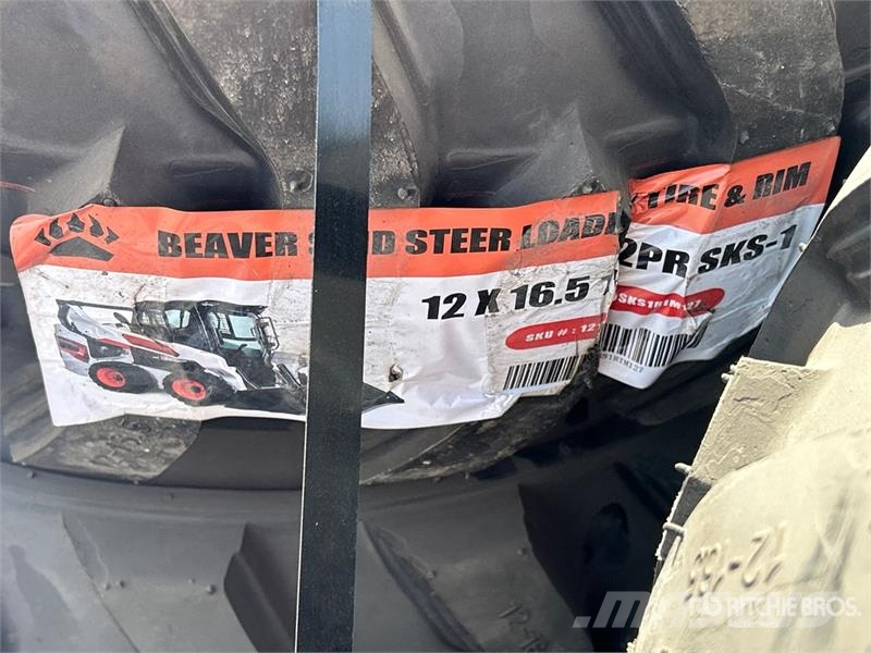 Quantity of (4) 12-16.5 NHS Skid Steer Tires (Unus Gume, točkovi i felne