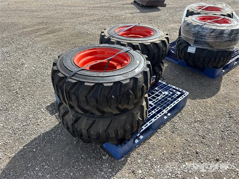 Quantity of (4) 12-16.5 NHS Skid Steer Tires (Unus Gume, točkovi i felne