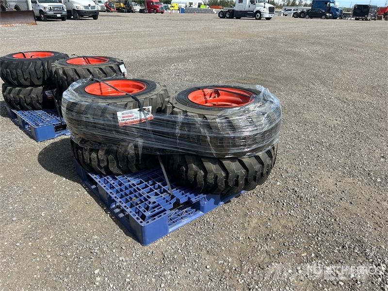 Quantity of (4) 12-16.5 NHS Skid Steer Tires (Unus Gume, točkovi i felne