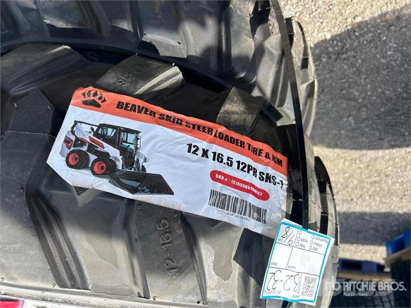 Quantity of (4) 12-16.5 NHS Skid Steer Tires (Unus Gume, točkovi i felne