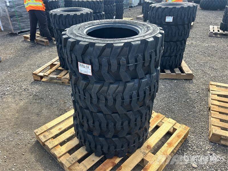 Quantity of (4) 12-16.5 Heavy Duty Tires (Unused) Gume, točkovi i felne