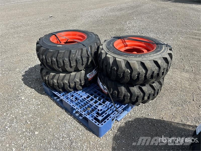 Quantity of (4) 12-16.5 NHS Skid Steer Tires (Unus Gume, točkovi i felne