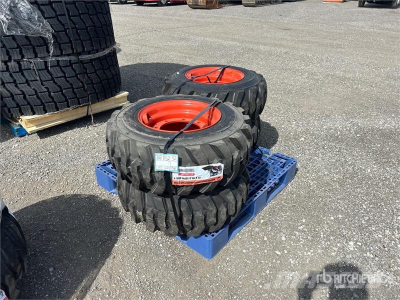 Quantity of (4) 12-16.5 NHS Skid Steer Tires (Unus Gume, točkovi i felne