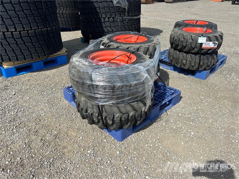 Quantity of (4) 12-16.5 NHS Skid Steer Tires (Unus Gume, točkovi i felne