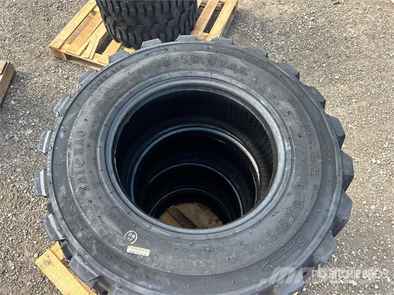 Quantity of (4) 12-16.5 Heavy Duty Tires (Unused) Gume, točkovi i felne