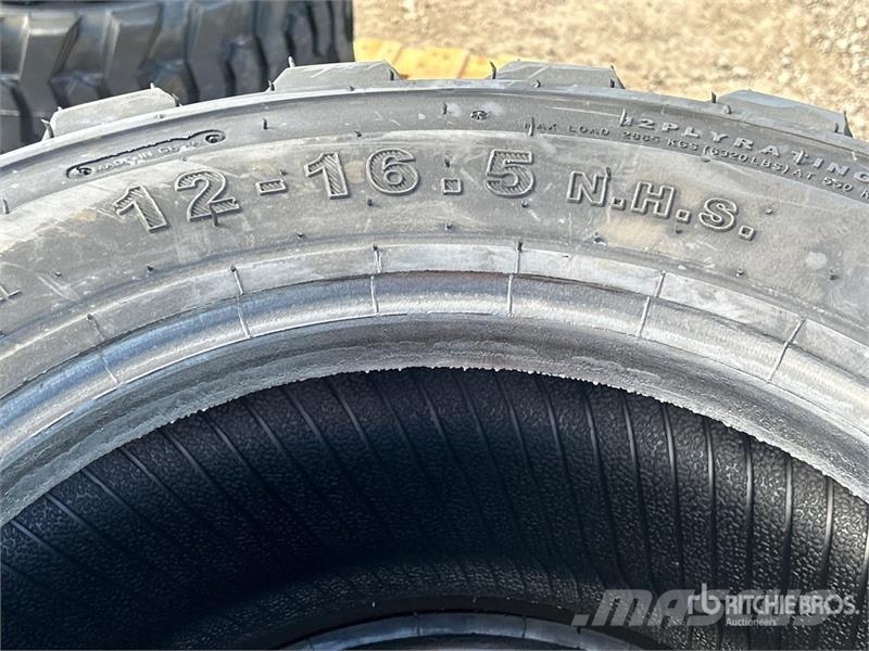 Quantity of (4) 12-16.5 Heavy Duty Tires (Unused) Gume, točkovi i felne