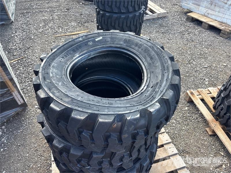 Quantity of (4) 12-16.5 Heavy Duty Tires (Unused) Gume, točkovi i felne