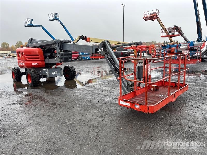 SkyJack SJ63AJ 4WD Dual Fuel Articulating Boom Lift Strēles pacēlāji