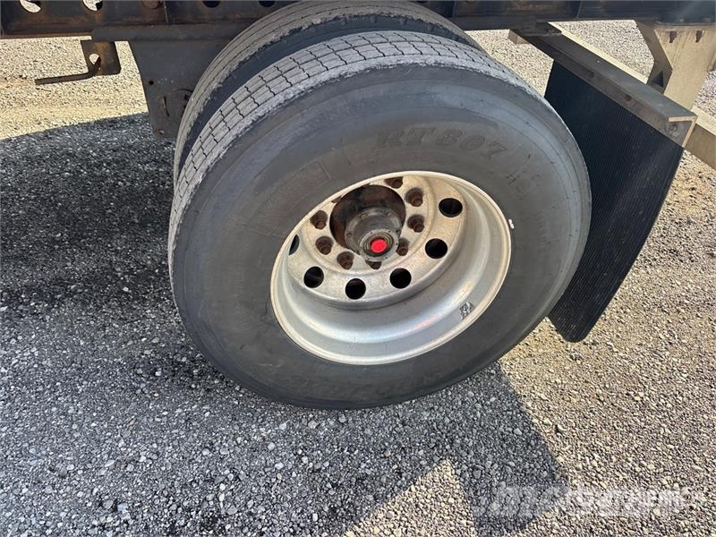 Wilson Roadbrute 53 ft T/A Spread Axle Flatbed Trailer Rimorchi con sponde ribaltabili