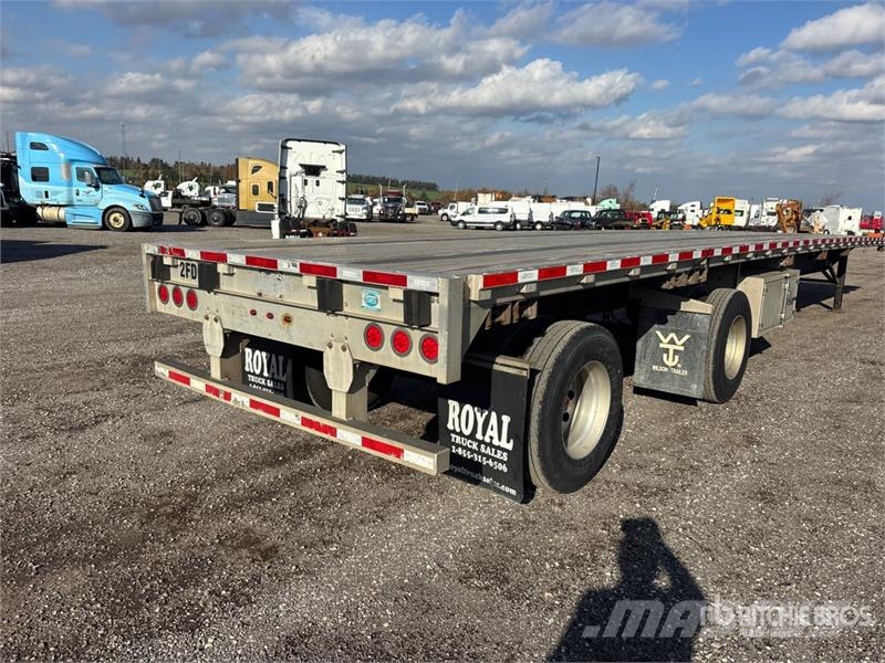 Wilson Roadbrute 53 ft T/A Spread Axle Flatbed Trailer Rimorchi con sponde ribaltabili