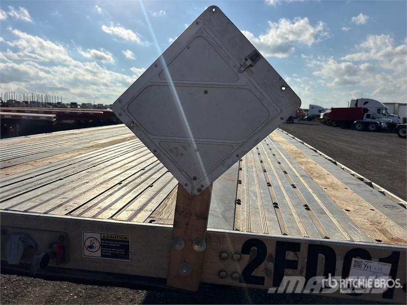 Wilson Roadbrute 53 ft T/A Spread Axle Flatbed Trailer Rimorchi con sponde ribaltabili