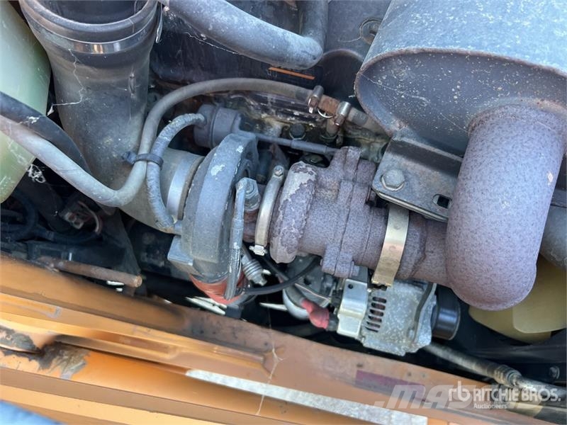 CASE 695 Super R 4x4x4 Chargeuse-Pelleteuse 4x4x4 Backh Rýpadlo-nakladače