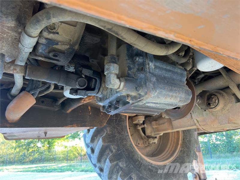 CASE 695 Super R 4x4x4 Chargeuse-Pelleteuse 4x4x4 Backh Rýpadlo-nakladače