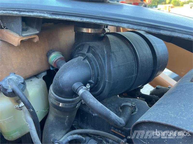 CASE 695 Super R 4x4x4 Chargeuse-Pelleteuse 4x4x4 Backh Rýpadlo-nakladače