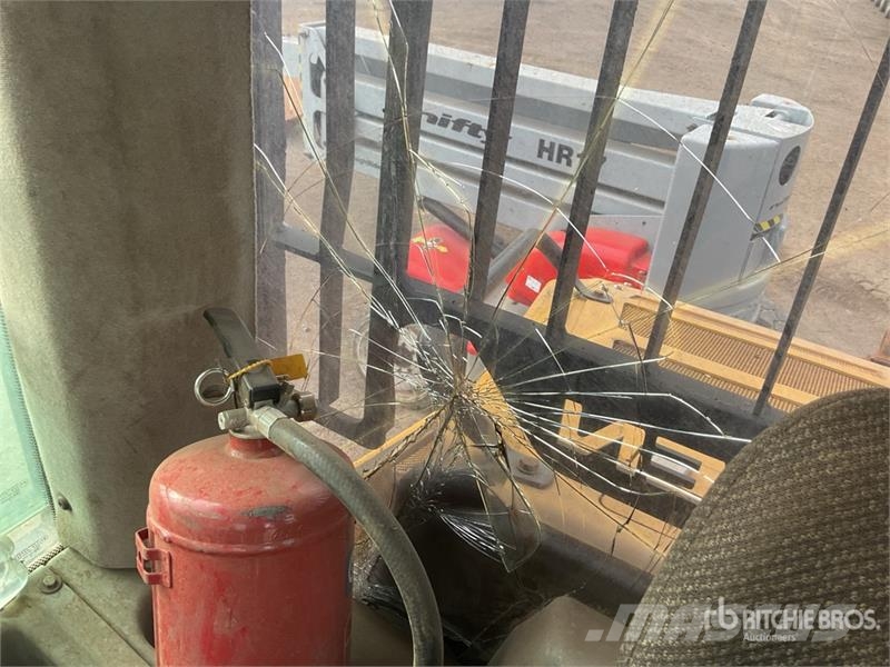 CAT 973D Гусеничные фронтальные погрузчики