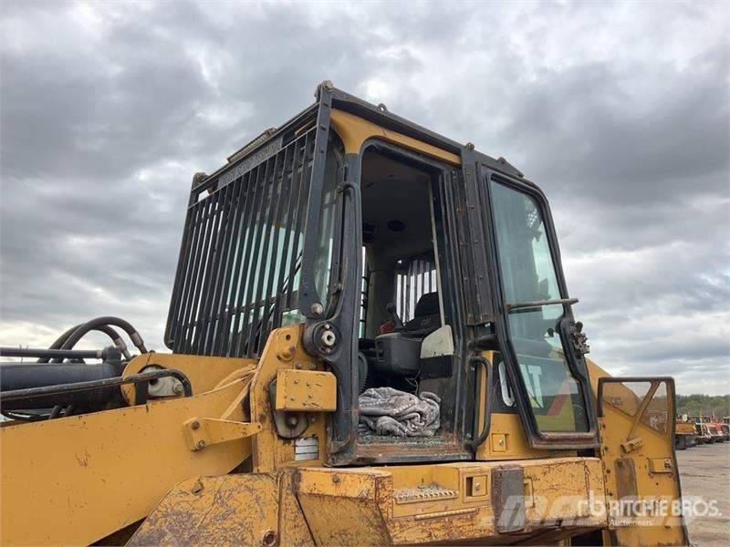 CAT 973D Гусеничные фронтальные погрузчики