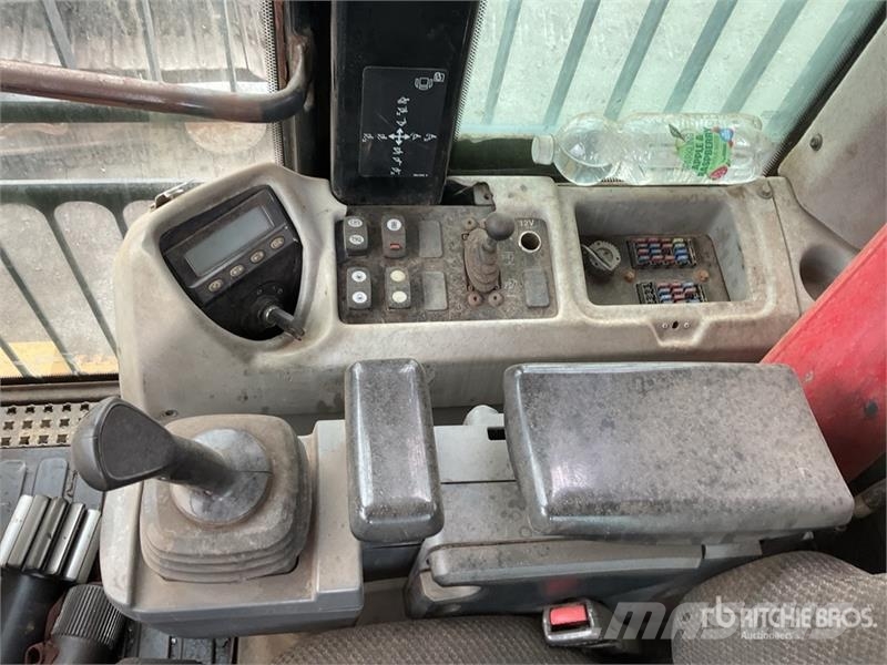 CAT 973D Гусеничные фронтальные погрузчики