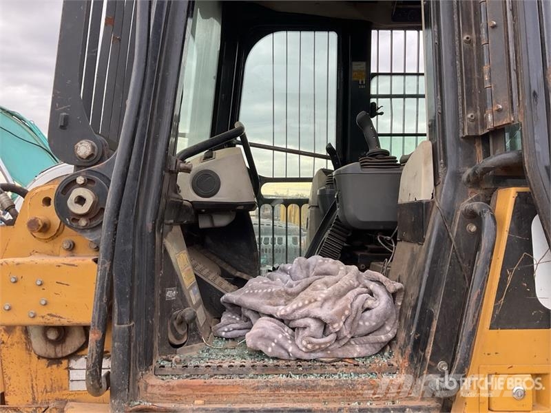 CAT 973D Гусеничные фронтальные погрузчики