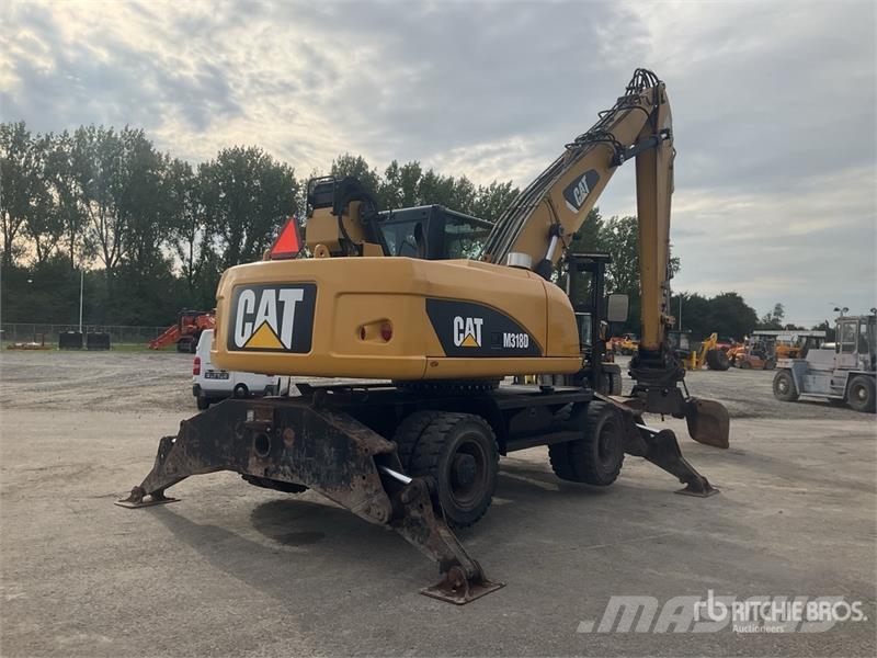 CAT M318 Wheeled excavators