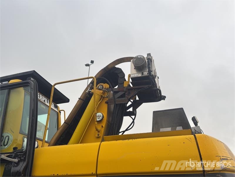 CAT M318C Bagri na kolesih