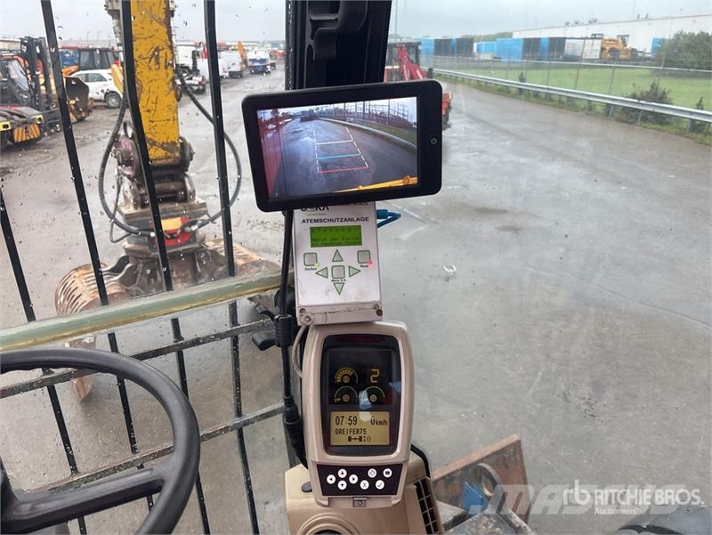 CAT M318C Bagri na kolesih