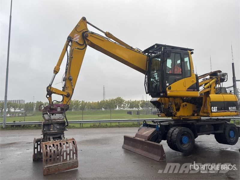 CAT M318C Bagri na kolesih