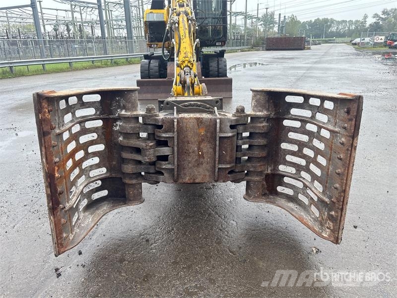 CAT M318C Bagri na kolesih