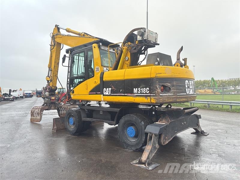 CAT M318C Bagri na kolesih