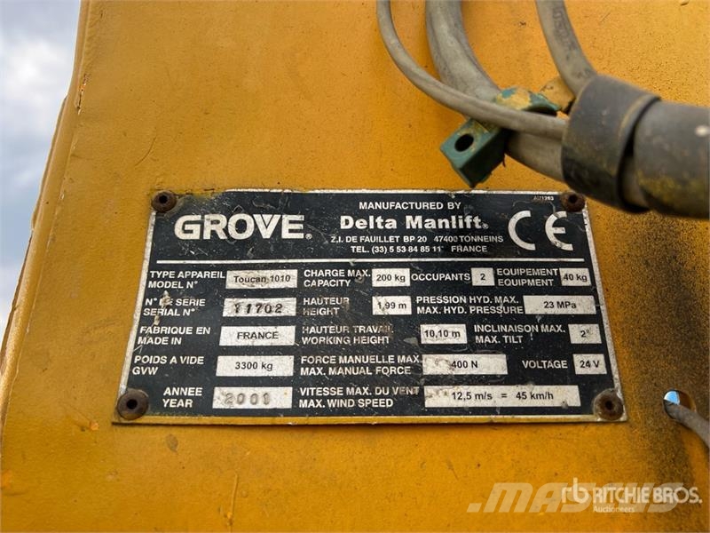 Grove Toucan 1010 Vertical Mast Lift Plataformas con jaula de elevación