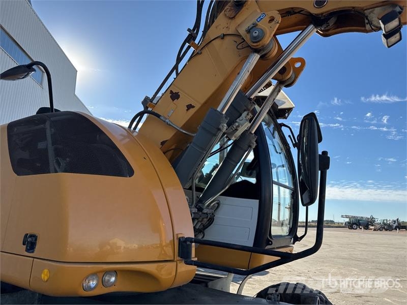 Liebherr 914 Compact Pelle Sur Pneus Wheel Excavator Kolová rýpadla