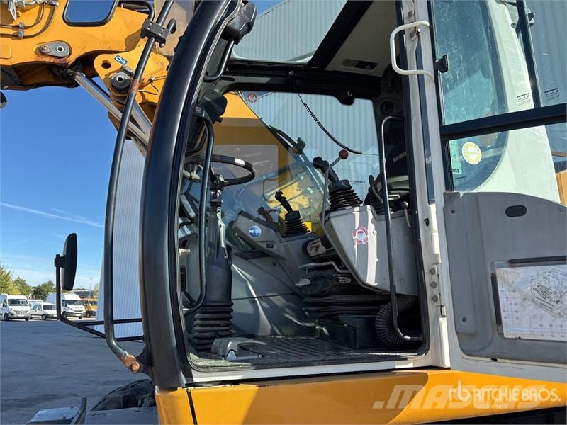 Liebherr 914 Compact Pelle Sur Pneus Wheel Excavator Kolová rýpadla