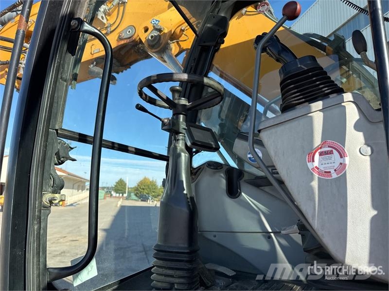 Liebherr 914 Compact Pelle Sur Pneus Wheel Excavator Kolová rýpadla