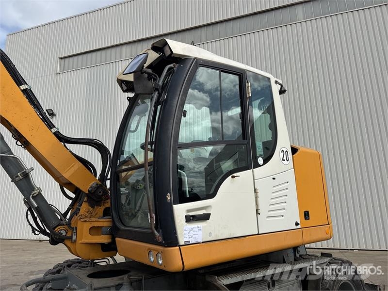 Liebherr A910 Compact Pelle Sur Pneus Wheel Excavator Ratiniai ekskavatoriai