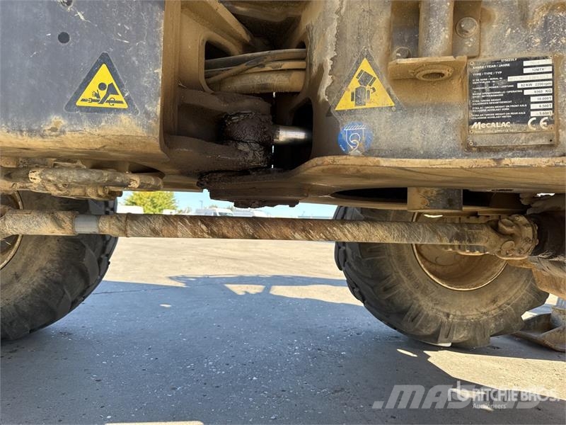 Mecalac 12MTX حفارات بعجل