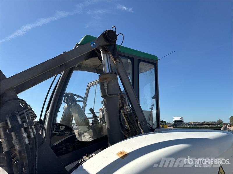 Mecalac 12MTX حفارات بعجل