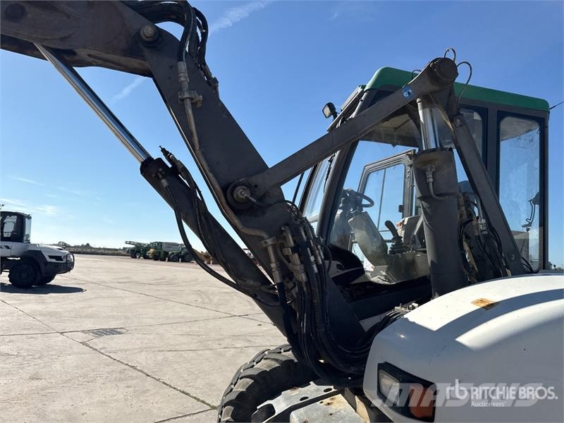 Mecalac 12MTX حفارات بعجل