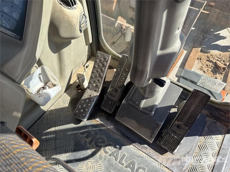Mecalac 12MTX حفارات بعجل