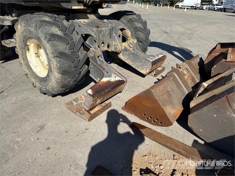 Mecalac 12MTX حفارات بعجل