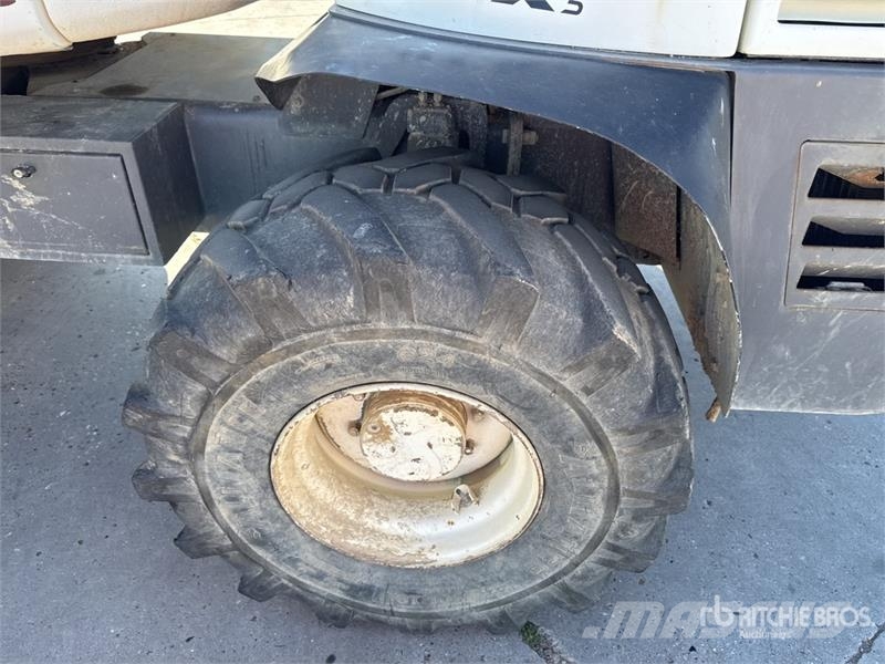 Mecalac 12MTX حفارات بعجل